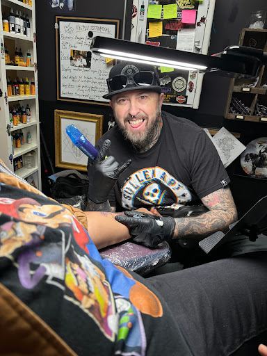 Explore skull and roses tattoo ideas, creative tattoo ideas in Warner Robins, available at Untold Pain Tattoo Studio