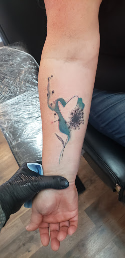 Explore tree tattoo ideas, creative tattoo ideas in Cornelia, available at Prismatic Pulse Tattoo