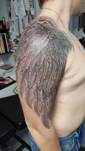 Explore tattoo word ideas for men, creative tattoo ideas in Wichita, available at Body Canvas Tattooing