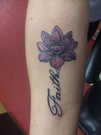 Explore name tattoos on wrist ideas, creative tattoo ideas in Turner, available at Heathen Ink