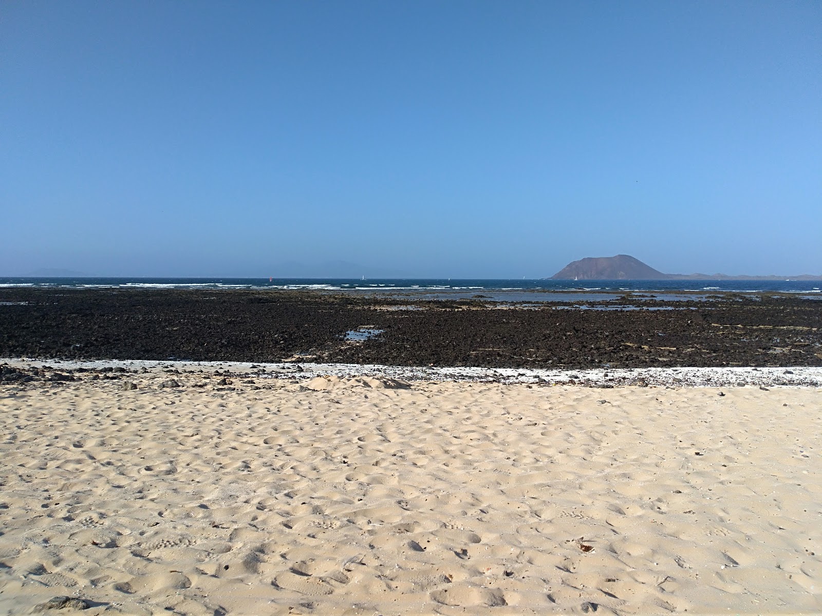 Playa Punta Prieta的照片 带有岩石覆盖表面