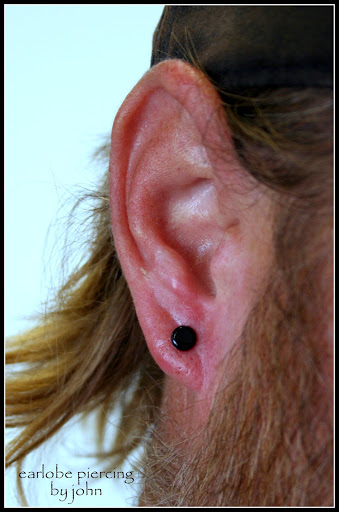 Find gizmo tattoo ideas for your next unique tattoo in Fort Myers at Tiger Lotus Tattoo and Piercing