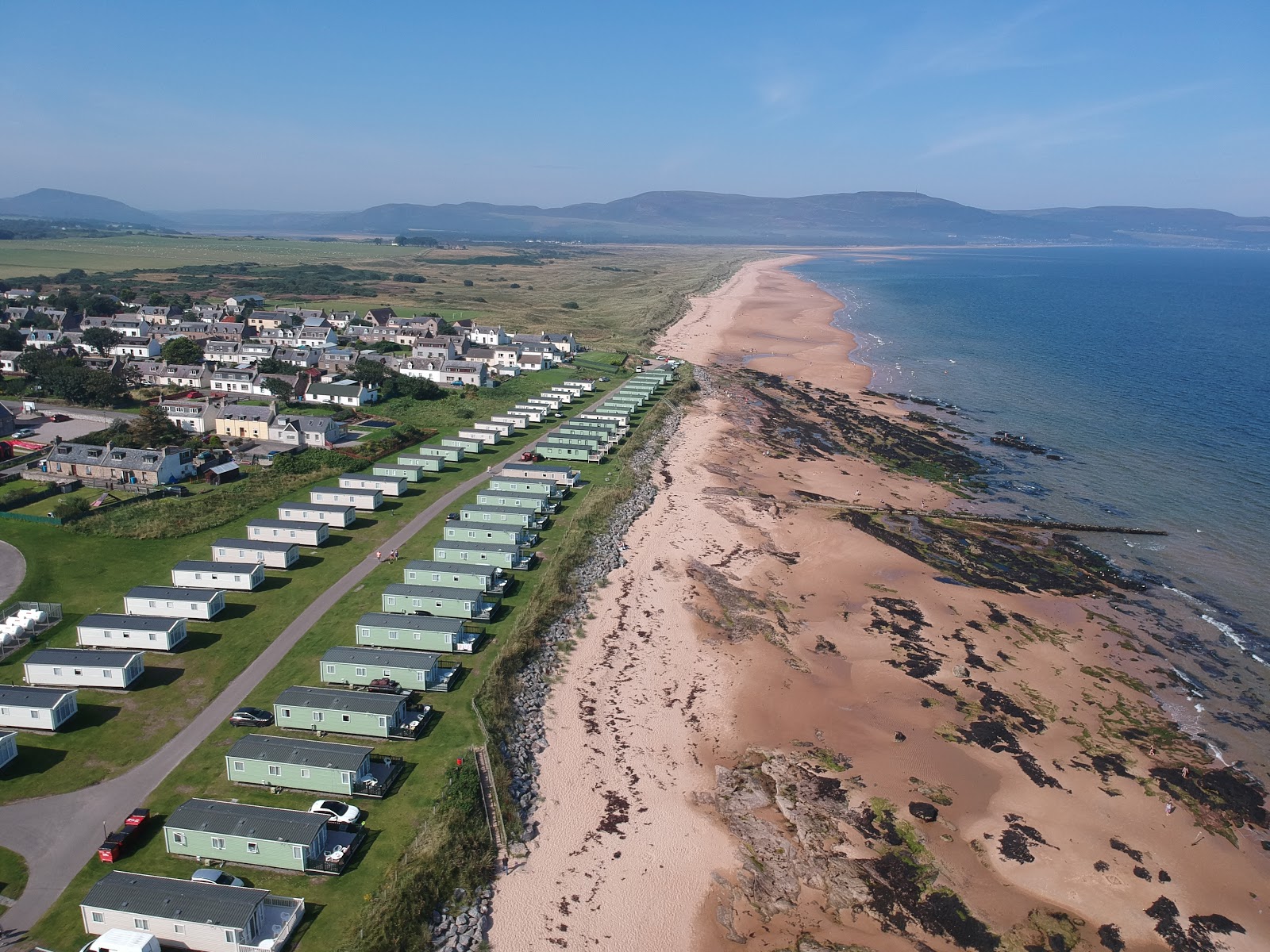 Photo of Embo Beach with long straight shore