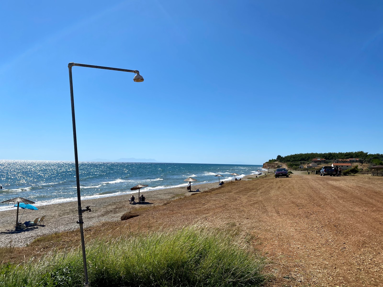 Foto di Paralia Alkionas con una superficie del ciottoli beige