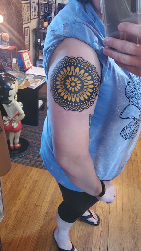 Find halo tattoo ideas for your next unique tattoo in Canton at The Inkeepers Tattoo Parlor