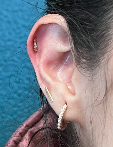 Explore tattoo cover up ideas for ring finger, creative tattoo ideas in Roseville, available at Ravens Mark Body Art Collective Tattoos & Piercings