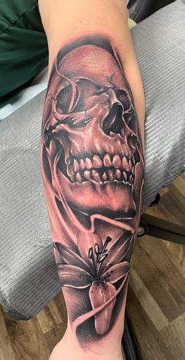 Explore covering up name tattoos ideas, creative tattoo ideas in Fargo, available at Golden Dragon Tattoo