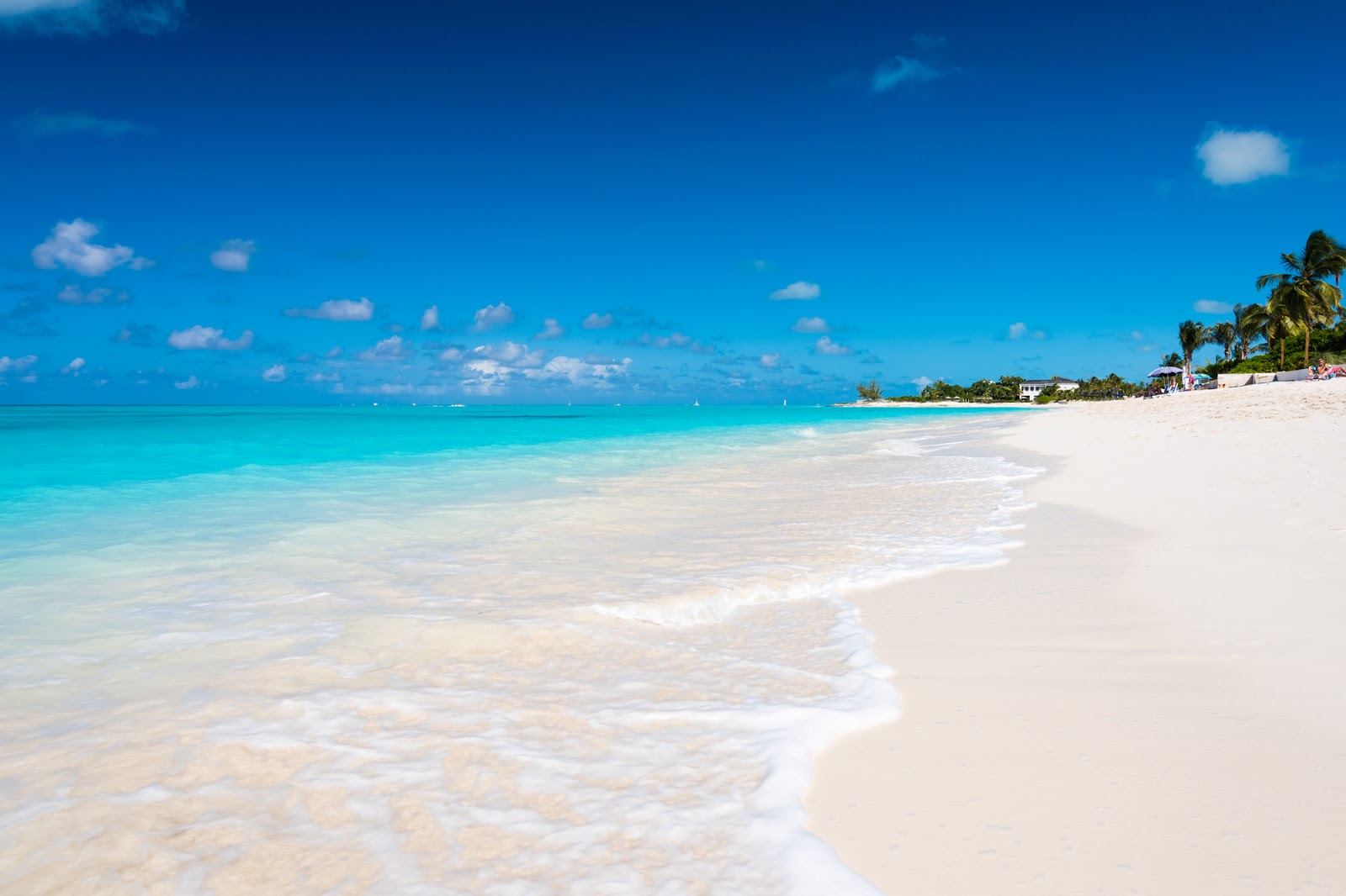 Photo de Plage de Sunset avec sable fin blanc de surface