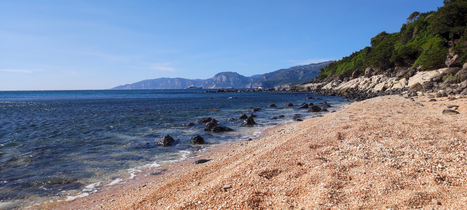 Fotografija Spiaggia di S'Abba Meica z ravna obala