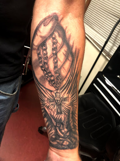 Explore loki tattoo ideas, creative tattoo ideas in Charlottesville, available at Mystic Tattoo and Body Piercing