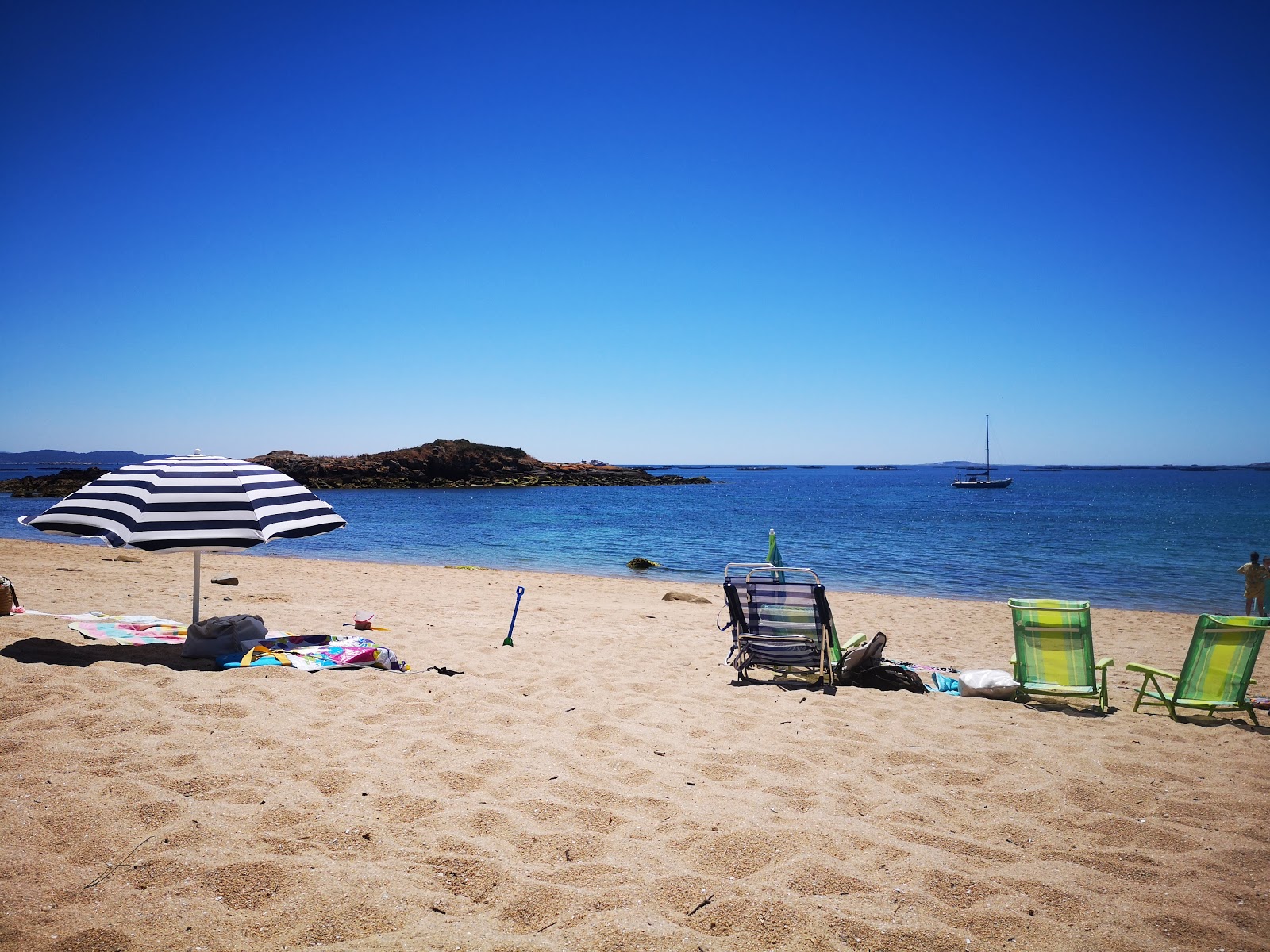 Fotografija Illa beach z turkizna čista voda površino