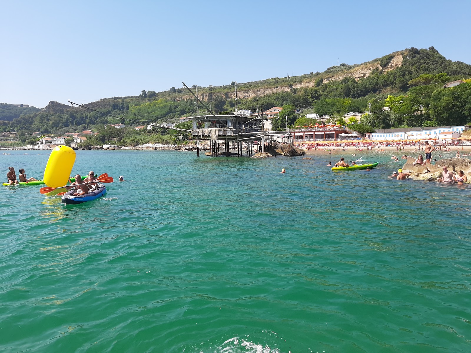 Fotografie cu Spiaggia di Cavalluccio și așezarea