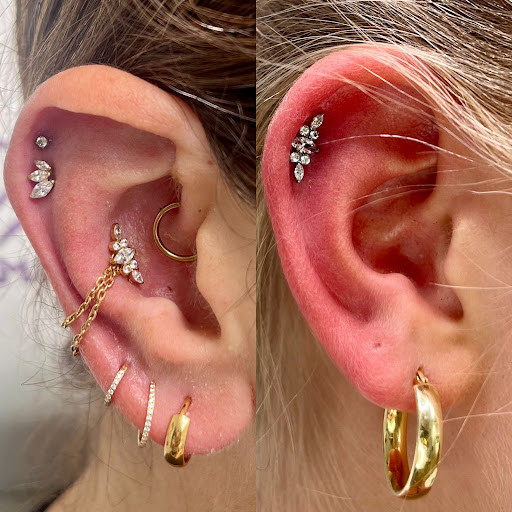 Explore under breast tattoo ideas for females, creative tattoo ideas in Seneca, available at Holesome Family Body Piercing