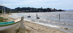 Foto von Praia de Pontal mit türkisfarbenes wasser Oberfläche