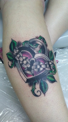 Explore nigerian tattoo ideas, creative tattoo ideas in Lima, available at Awesome Tat-2-U