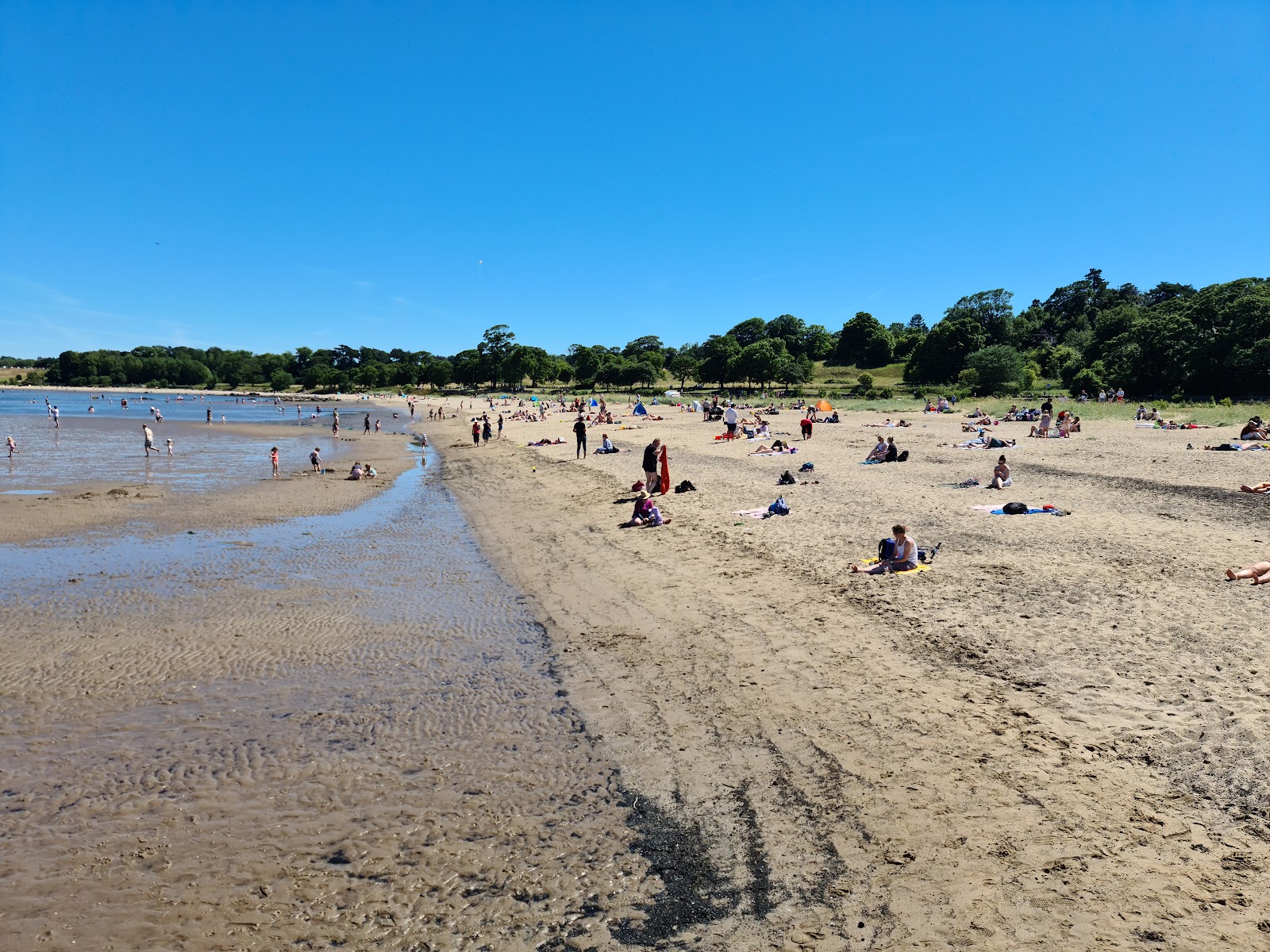 Photo of Cramond Beach with bright sand surface