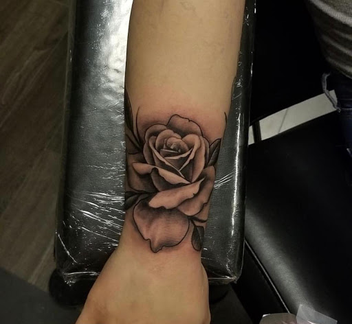 Explore rip tattoo ideas for guys, creative tattoo ideas in Fort Wayne, available at Grade A Tattoos and Body Piercing