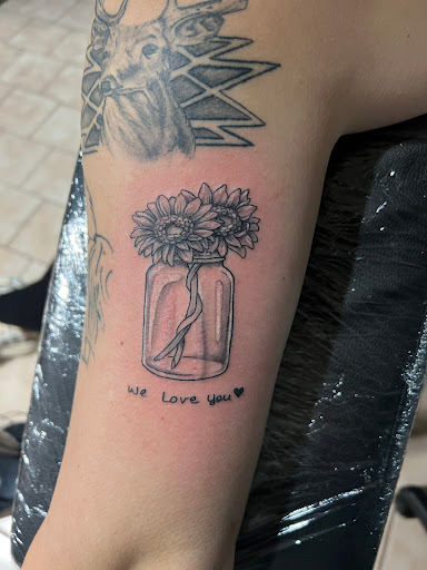 Explore name hand tattoo ideas, creative tattoo ideas in Joplin, available at Winterhart Studio