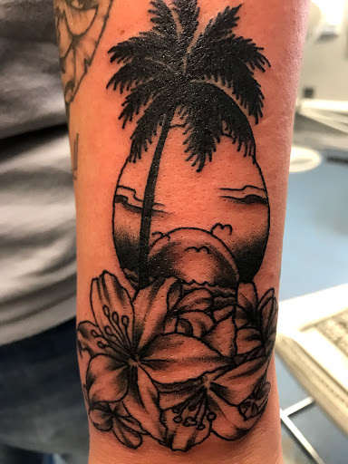 Explore tattoo music sleeve ideas, creative tattoo ideas in Muncie, available at The Tattoo Studio