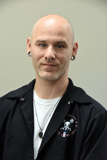 Explore black men tattoo ideas, creative tattoo ideas in Wisconsin Dells, available at Twisted Dimensions Tattoo Studio