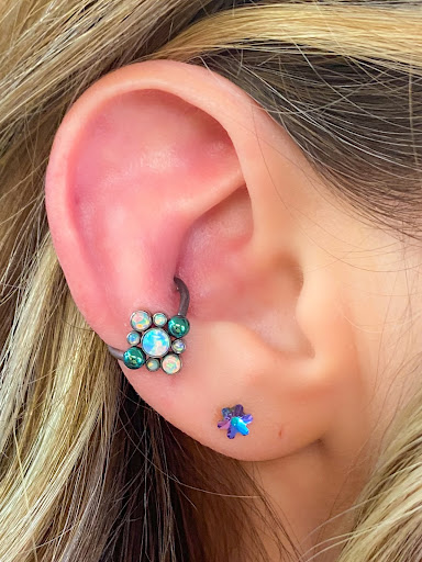 Explore family initials tattoo ideas, creative tattoo ideas in Springfield, available at Body Piercing By Qui Qui