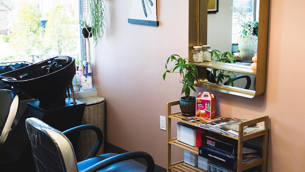 Feathered Hair Salon 27560