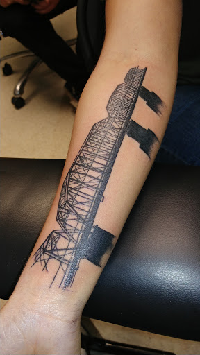 Explore mens upper back tattoo ideas, creative tattoo ideas in Chattanooga, available at American Ink