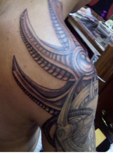 Explore joker hand tattoo ideas, creative tattoo ideas in Hialeah, available at Allstar Tattoo & Body piercing