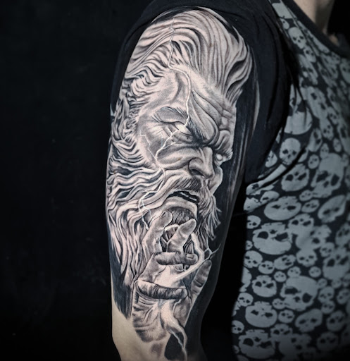 Logo da empresa - Astronautatattoo e piercing