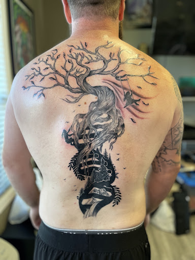 Explore mens bicep tattoo ideas, creative tattoo ideas in Watford City, available at Soulful Ink Studios