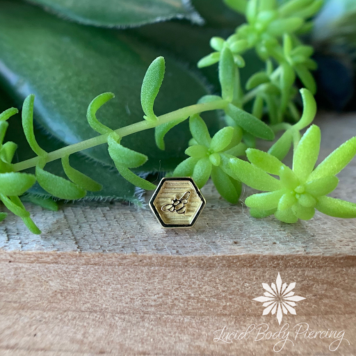 Explore flag tattoo ideas, creative tattoo ideas in Akron, available at Lucid Body Piercing