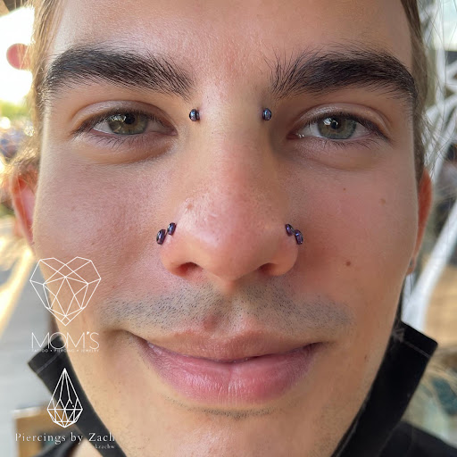 Explore queen crown tattoo ideas, creative tattoo ideas in Spokane, available at Moms Custom Tattoo & Body Piercing