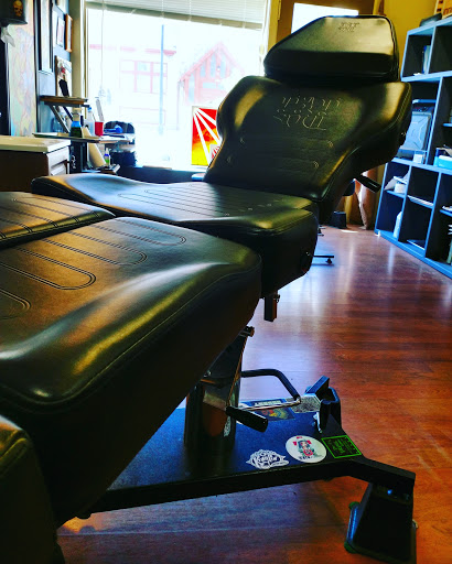 Explore tattoo ideas for older women, creative tattoo ideas in Cheyenne, available at The T.R.I.B.E. Zoo, LLC Tattoo