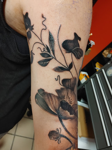 Explore tattoo ideas to cover up, creative tattoo ideas in Hereford, available at Slow Pain Tattoo Body Art Studio