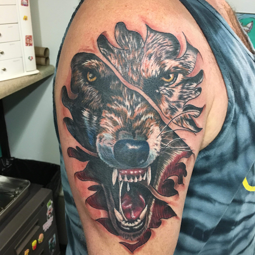 Explore tattoo ideas for men shoulder, creative tattoo ideas in Louisburg, available at Lewter Tattoos and Piercing