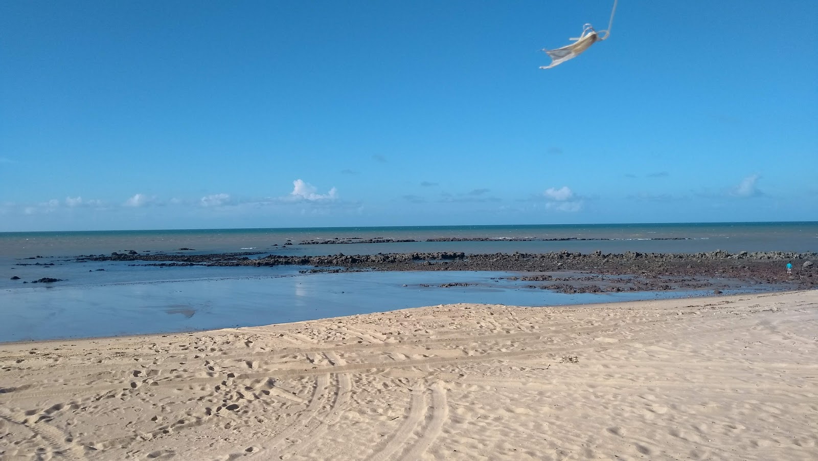 Fotografie cu Plaja Ponta da Pedra - locul popular printre cunoscătorii de relaxare