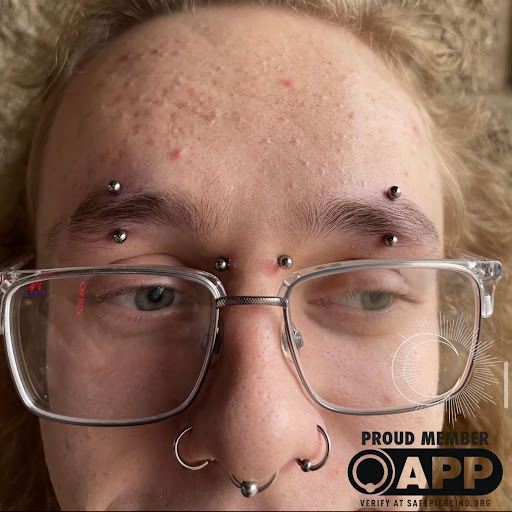 Explore ideas tattoo, creative tattoo ideas in Appleton, available at Celestial Piercing- Inside of Big Guns Tattoo