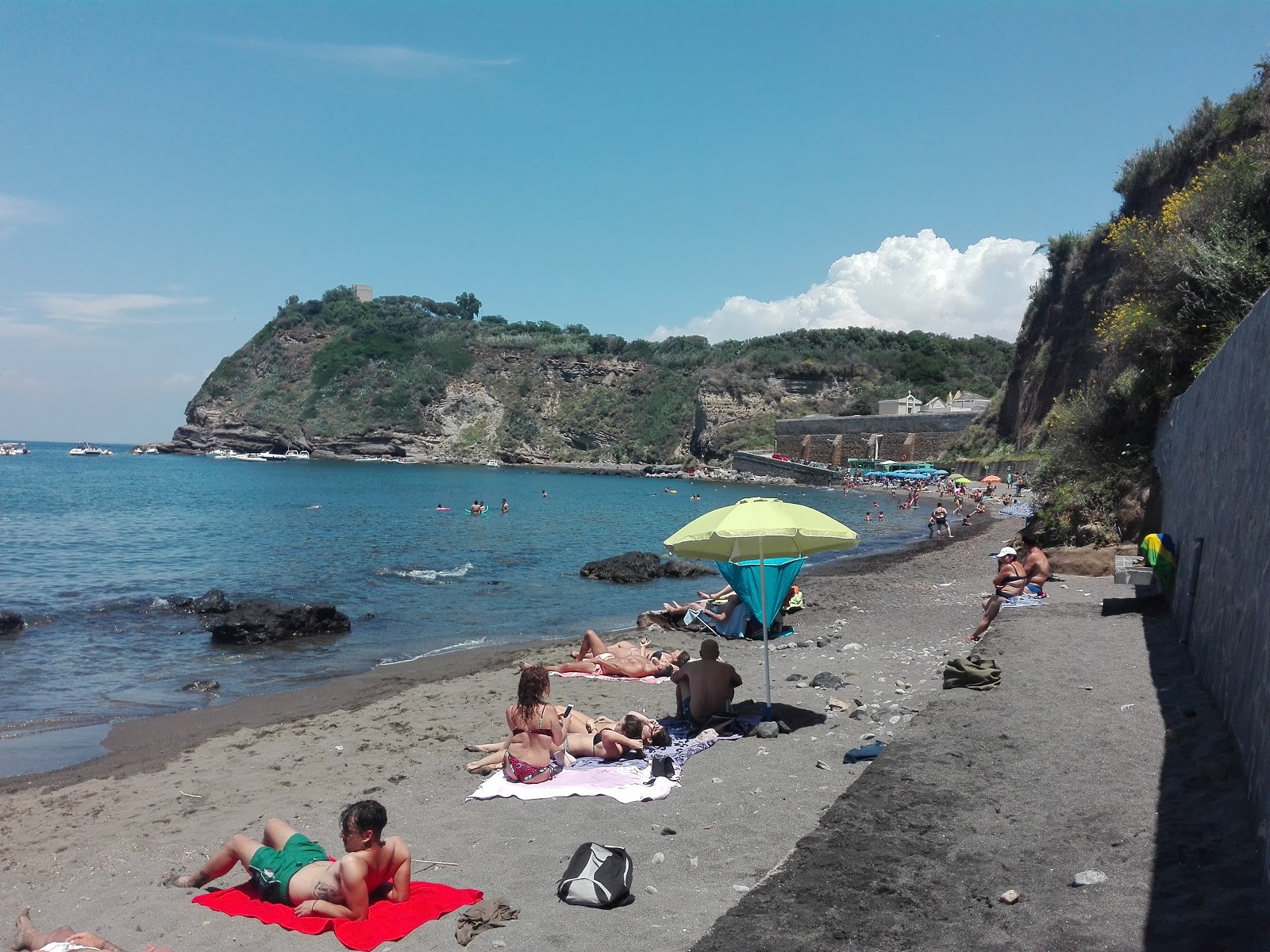 Zdjęcie Spiaggia Cala Del Pozzo Vecchio z powierzchnią niebieska woda