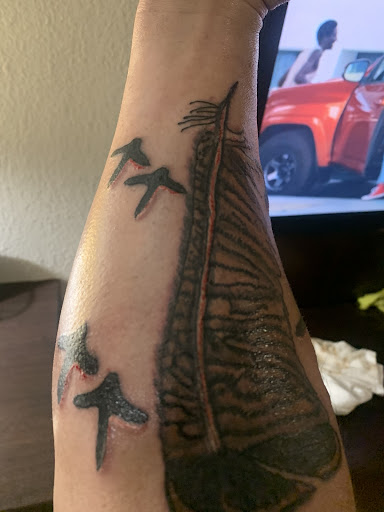 Explore sub tattoo ideas, creative tattoo ideas in Buffalo, available at East Coast Ink