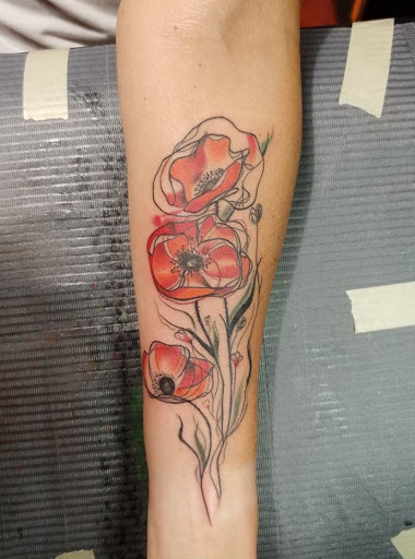 Explore finger print heart tattoo ideas, creative tattoo ideas in Rochester, available at Mellow Madness Tattoo Parlor