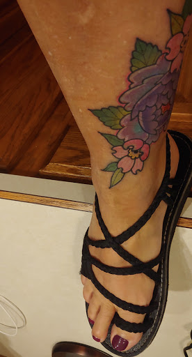 Explore forearm watercolor tattoo ideas, creative tattoo ideas in Little Rock, available at Love Spell Tattoo