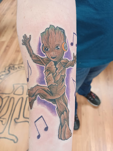 Explore tattoo cuff ideas, creative tattoo ideas in Belleville, available at Almighty Tattoos