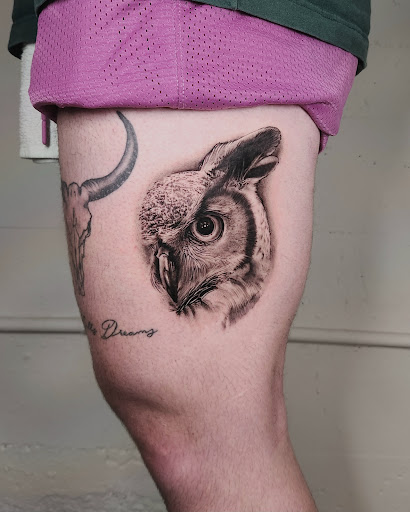 Explore cover up tattoo ideas for lower back, creative tattoo ideas in Independence, available at Bare Skin Tattoo