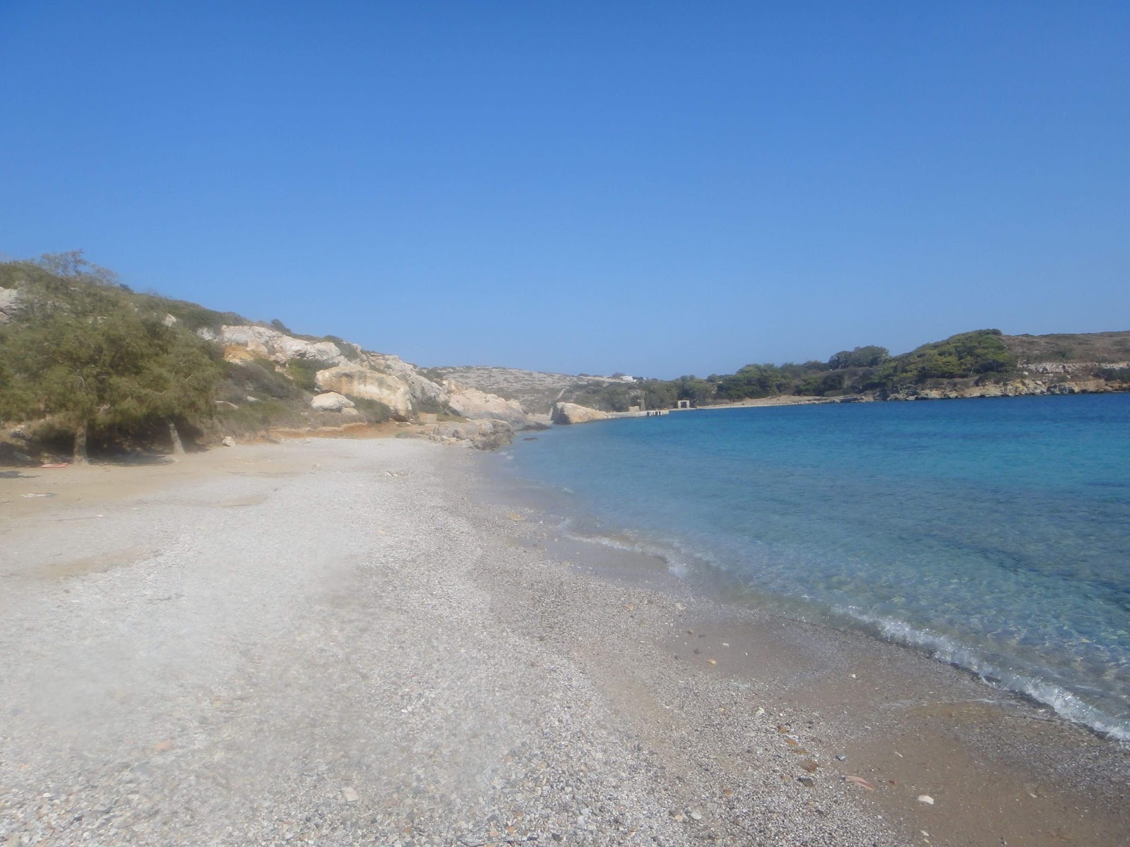 Photo of August beach with small bay