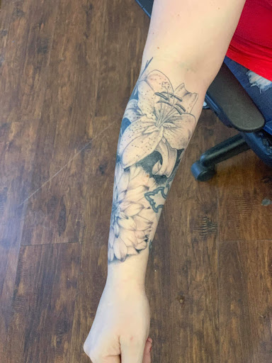 Explore neck tattoo ideas for women, creative tattoo ideas in Tacoma, available at Garfield Street Tattoo Co