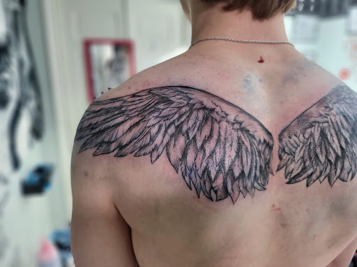 Explore kingfisher tattoo ideas, creative tattoo ideas in Carrollton, available at Neeces UniqueINK