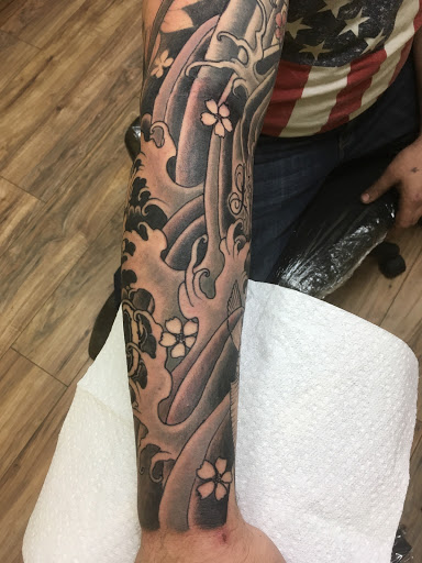 Explore slipknot tattoo ideas, creative tattoo ideas in Marysville, available at Elegant Arts Tattoo Parlor