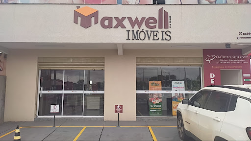 Logo da empresa - Maxwell Imóveis