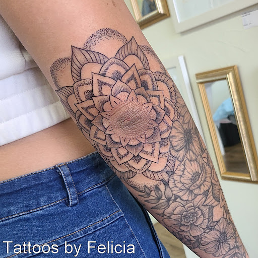 Explore family tattoo ideas, creative tattoo ideas in Fort Myers, available at Tiger Lotus Tattoo and Piercing