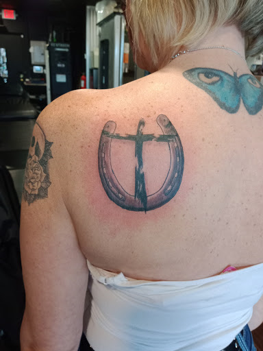 Explore tattoo half sleeve ideas tribal, creative tattoo ideas in Denison, available at Crossroads Tattoo Studio
